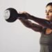 Fix your form: Two-arm overhead kettlebell squat