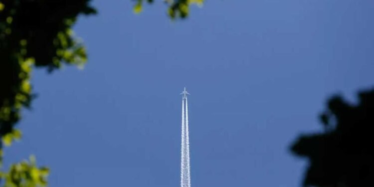 Experts reveal the truth behind those white streaks trailing planes in the sky