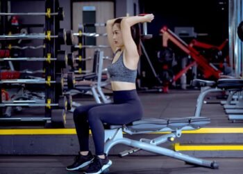 Master the move: Seated overhead triceps extension