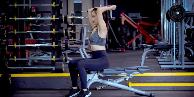 Master the move: Seated overhead triceps extension